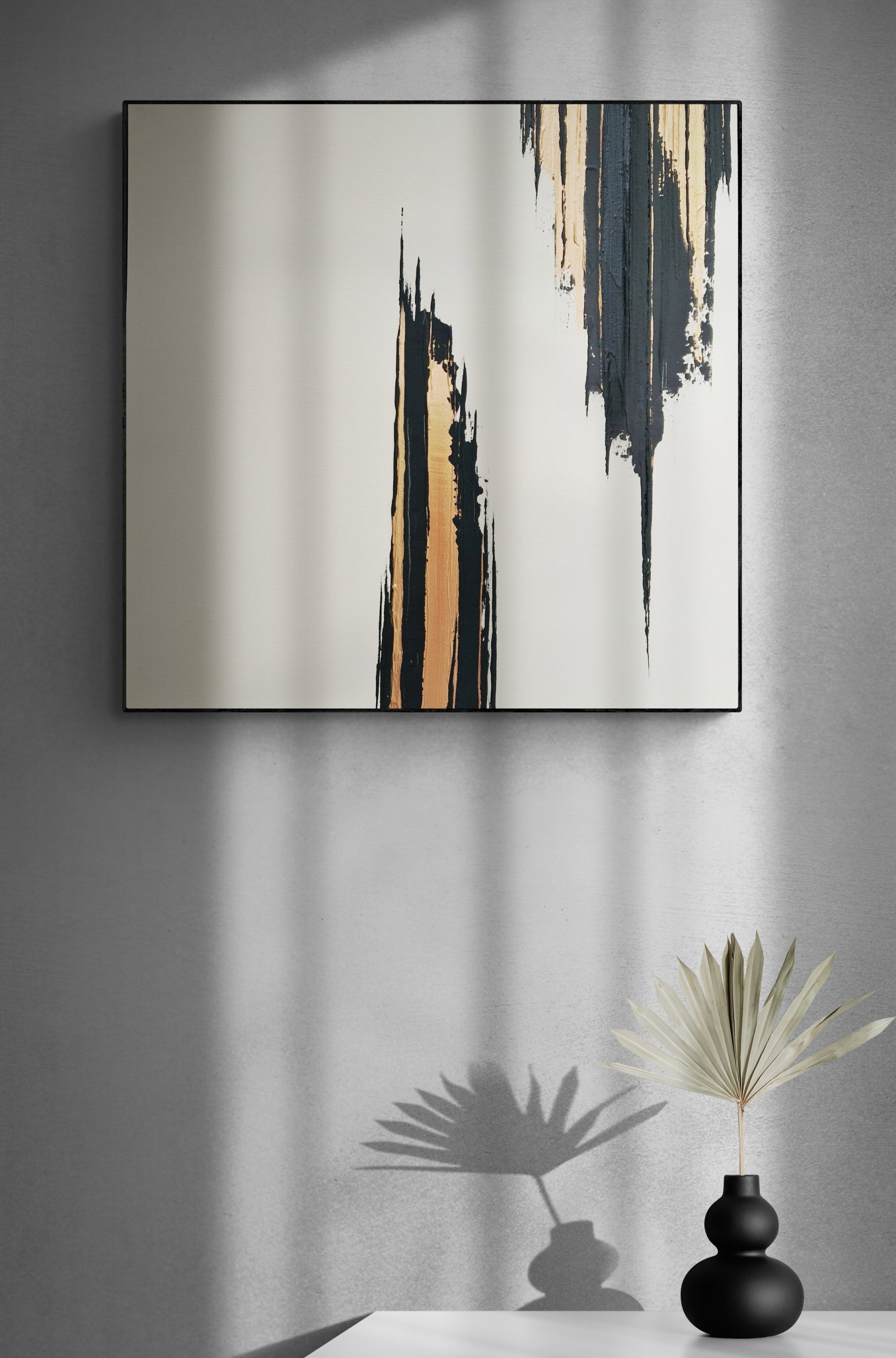 black-vase-with-dried-leaves-on-white-table_resized